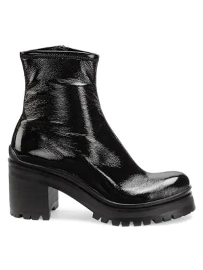 Shop Miu Miu Lug-sole Platform Ankle Boots In Nero