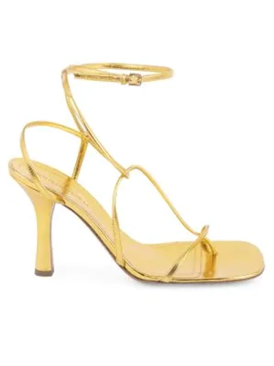 Shop Bottega Veneta Strappy Leather Sandals In Gold