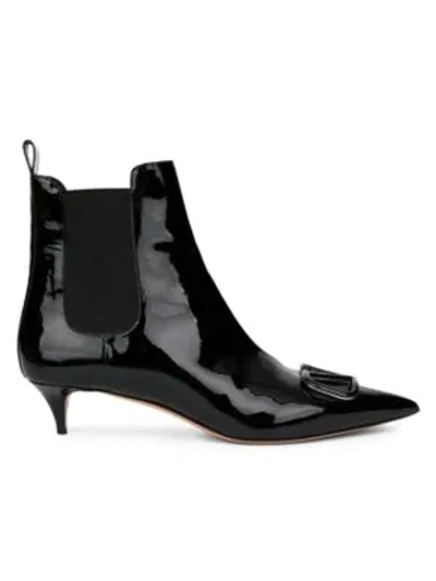 Shop Valentino Garavani Vlogo Patent Chelsea Boots In Nero