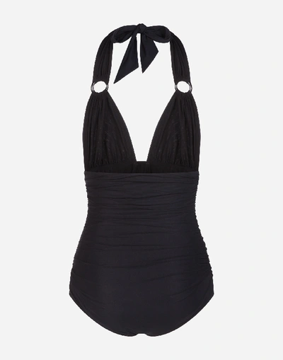 Shop Dolce & Gabbana Solid-color One-piece Swimsuit With Plunging Neckline In Black
