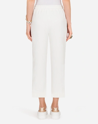 Shop Dolce & Gabbana Cady Pants In White