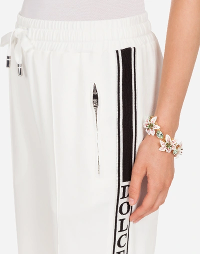 Shop Dolce & Gabbana Cady Pants In White