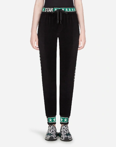 Shop Dolce & Gabbana Velvet Jogging Pants With Dg Logo Bands In Black