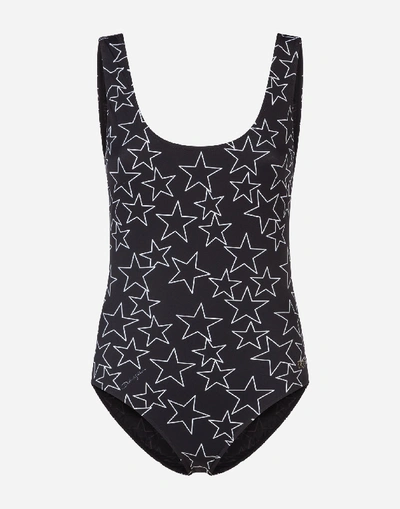 Shop Dolce & Gabbana Millennials Star Print One-piece Swimsuit In Black