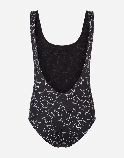 Shop Dolce & Gabbana Millennials Star Print One-piece Swimsuit In Black