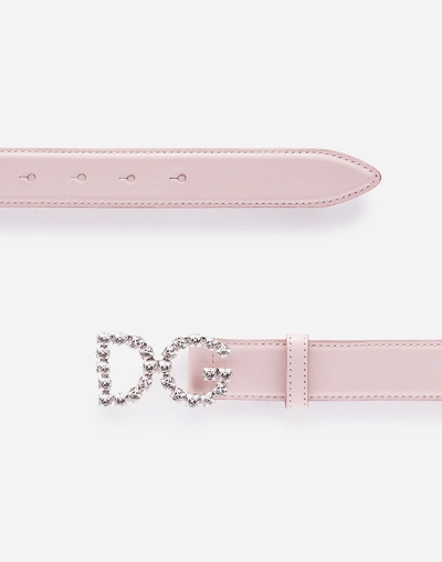 Shop Dolce & Gabbana Calfskin Belt With Dg Crystal Logo In Pink