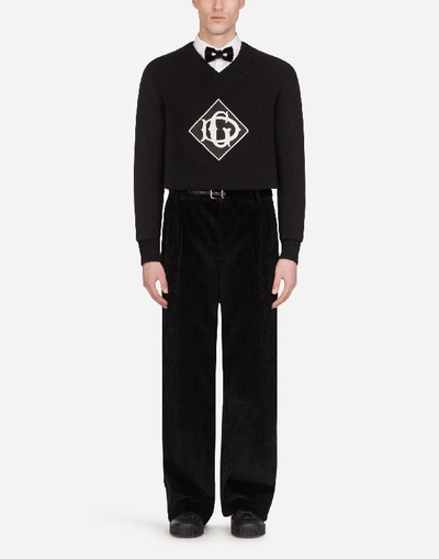Shop Dolce & Gabbana Wool V-neck Sweater With Patch In Black