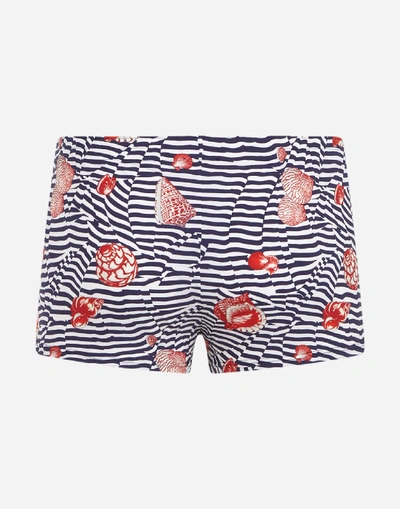 Shop Dolce & Gabbana Swimming Trunks With Shell Print