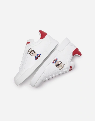 Shop Dolce & Gabbana Calfskin Nappa Portofino Sneakers With Patches Of The Designers In White