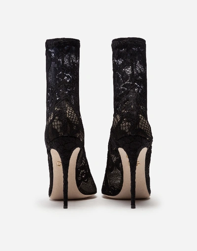 Shop Dolce & Gabbana Stretch Lace And Gros Grain Booties In Black