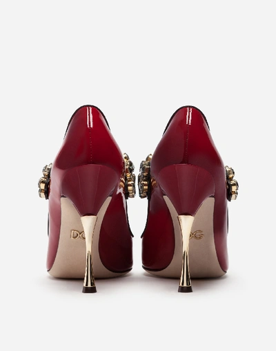 Shop Dolce & Gabbana Patent Leather Mary Janes With Bejeweled Strap In Burgundy