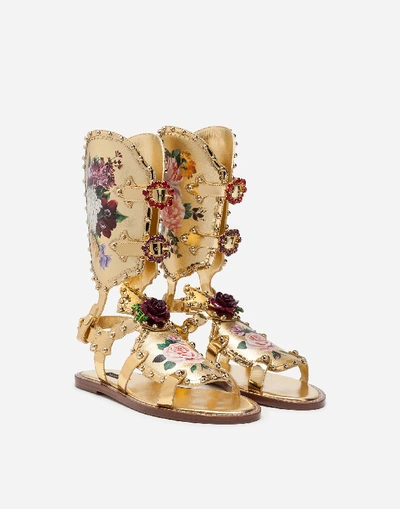 Shop Dolce & Gabbana Gladiator Sandals With Floral Painting And Studs In Gold