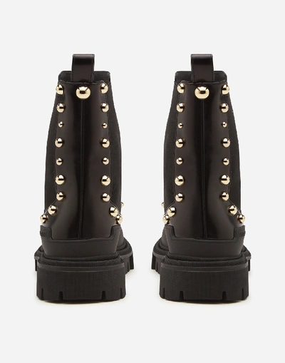 Shop Dolce & Gabbana Polished Calfskin Combat Boots With Studded Embroidery