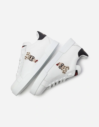 Shop Dolce & Gabbana Calfskin Nappa Portofino Sneakers With Patches Of The Designers In White