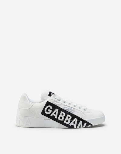 Shop Dolce & Gabbana Nylon Portofino Sneakers With Logo Tape In White/black