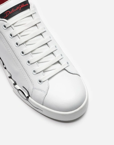 Shop Dolce & Gabbana Patent Calfskin Portofino Sneakers In White/red