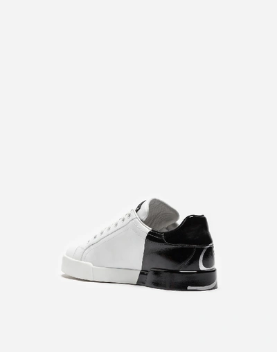 Shop Dolce & Gabbana Patent Calfskin Portofino Sneakers In White/black