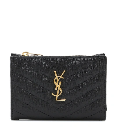 Shop Saint Laurent Monogram Zipped Leather Wallet In Black
