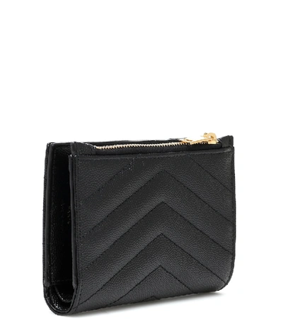 Shop Saint Laurent Monogram Zipped Leather Wallet In Black