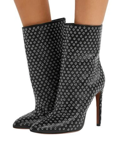 Shop Alaïa Ankle Boots In Black