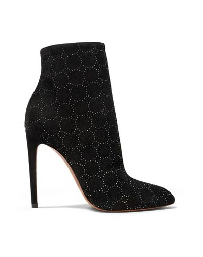 Shop Alaïa Ankle Boots In Black