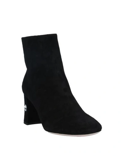 Shop Miu Miu Ankle Boots In Black