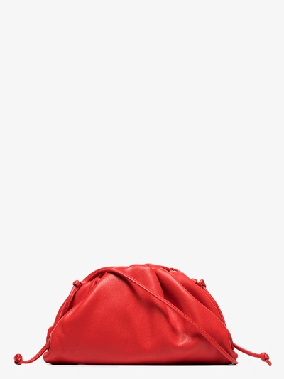 Shop Bottega Veneta Red The Mini Pouch Leather Clutch Bag