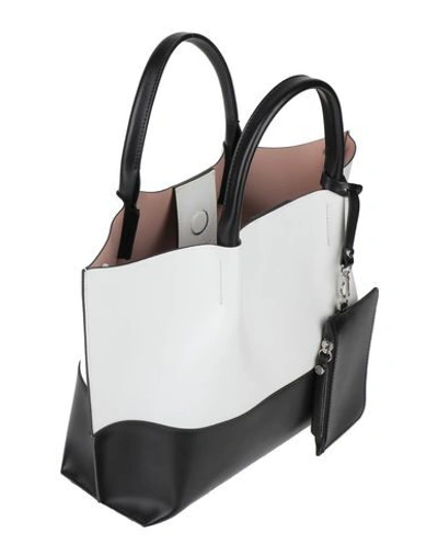 Shop Gianni Chiarini Handbags In White