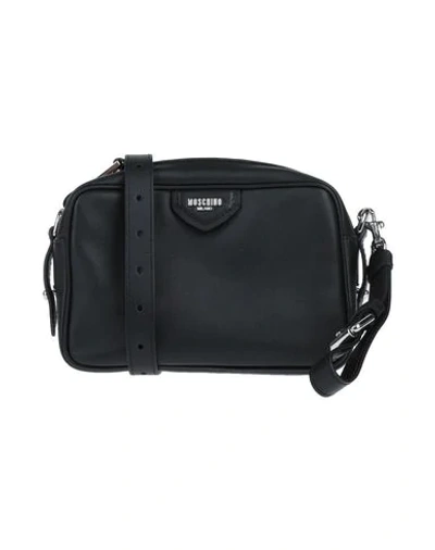 Shop Moschino Cross-body Bags In Black