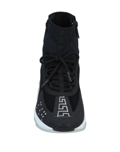 Shop Versace Sneakers In Black