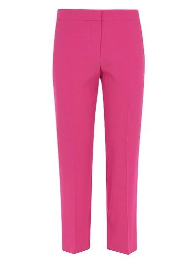Shop Alexander Mcqueen Cropped Trousers In Rosa