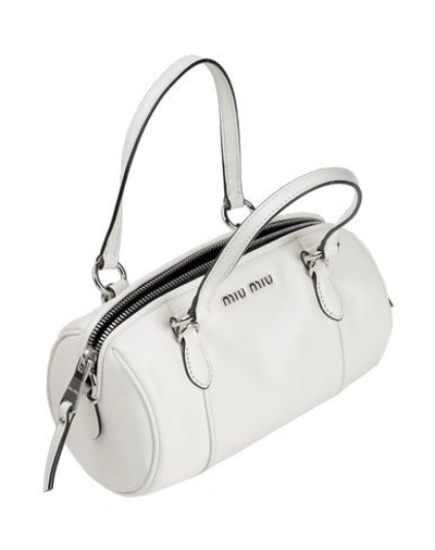 Shop Miu Miu Handbag In White