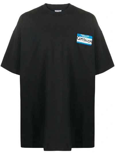 Shop Vetements Slogan-print T-shirt In Black
