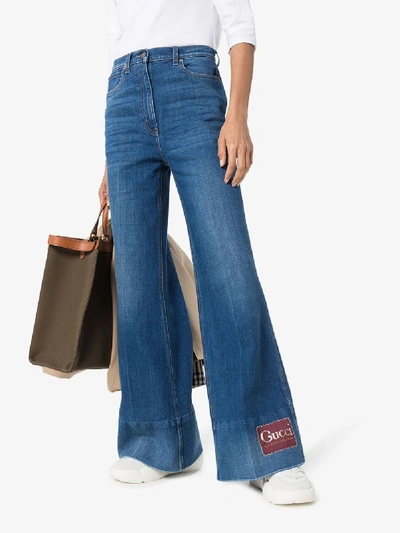 Shop Gucci Blue Flared Jeans