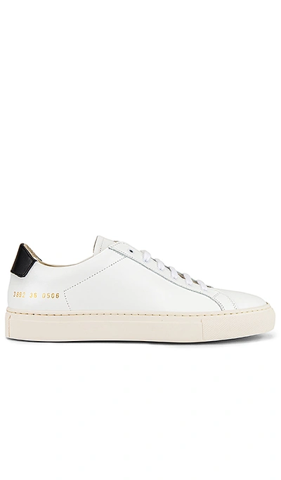 Shop Common Projects Retro Low Sneaker In White & Black