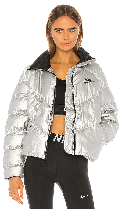 Shop Nike Puffer Jacket In Metallic Silver