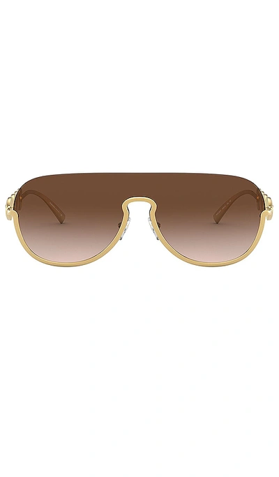 Shop Versace Medusa Rock Icons Shield In Gold & Brown Gradient
