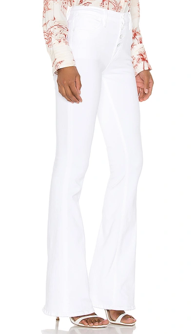 Shop Frame Le High Flare Exposed Buttons In Blanc