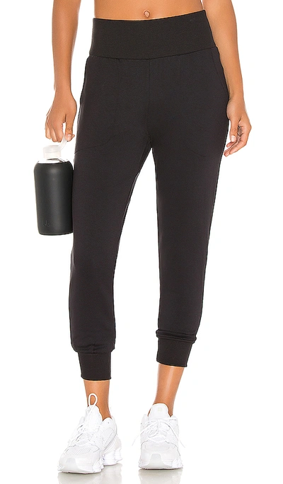 Shop Nike Yoga Flow 7/8 Pant In Black & Dark Smoke Grey