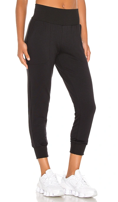 Shop Nike Yoga Flow 7/8 Pant In Black & Dark Smoke Grey
