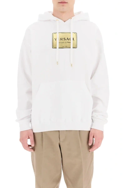 Shop Versace Plaque Print Hoodie In White,gold