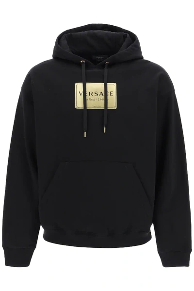 Shop Versace Plaque Print Hoodie In Black,gold