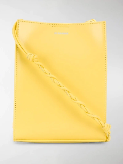 Shop Jil Sander Logo Print Crossbody Bag In Yellow