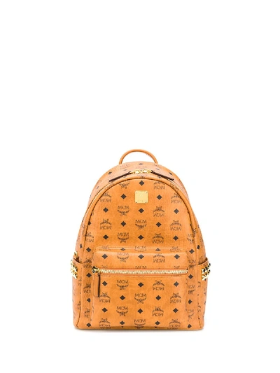 Shop Mcm Stark Studded Backpack In Brown