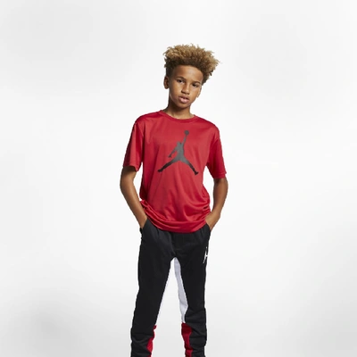 Shop Jordan Big Kids' Dri-fit Jumpman Logo T-shirt In Red