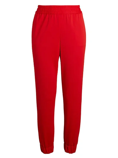 Shop Alice And Olivia Pete Tapered Jogging Pants In Paprika