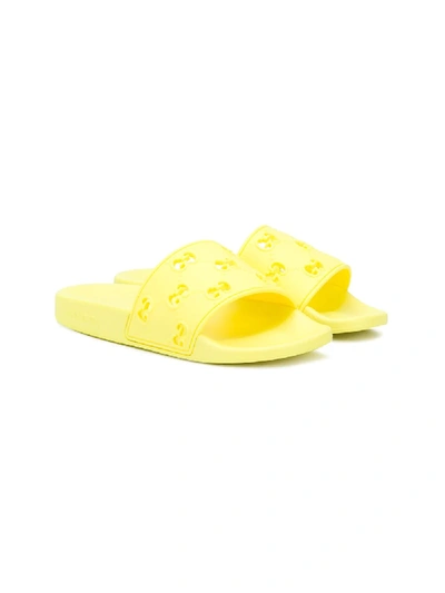 Shop Gucci Cut-out Gg Slides In Yellow