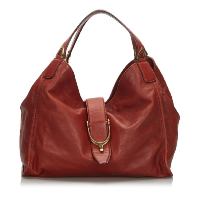 Shop Gucci Leather Stirrup Handbag In Red