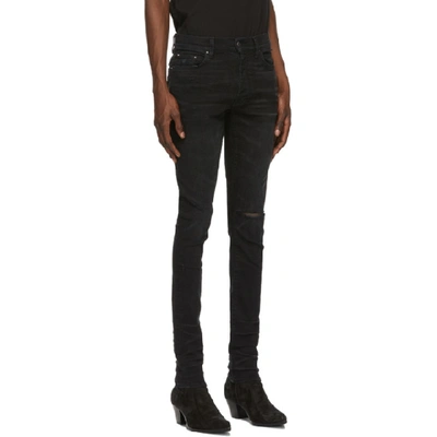 Shop Amiri Black Slit Knee Jeans In Abl