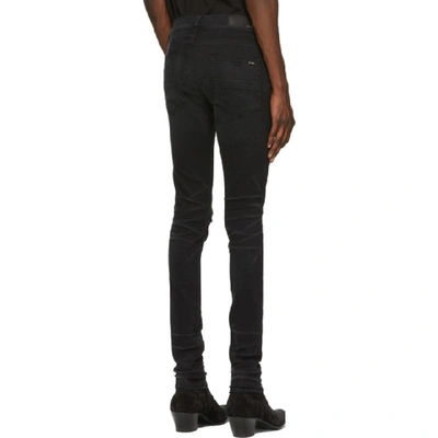 Shop Amiri Black Slit Knee Jeans In Abl